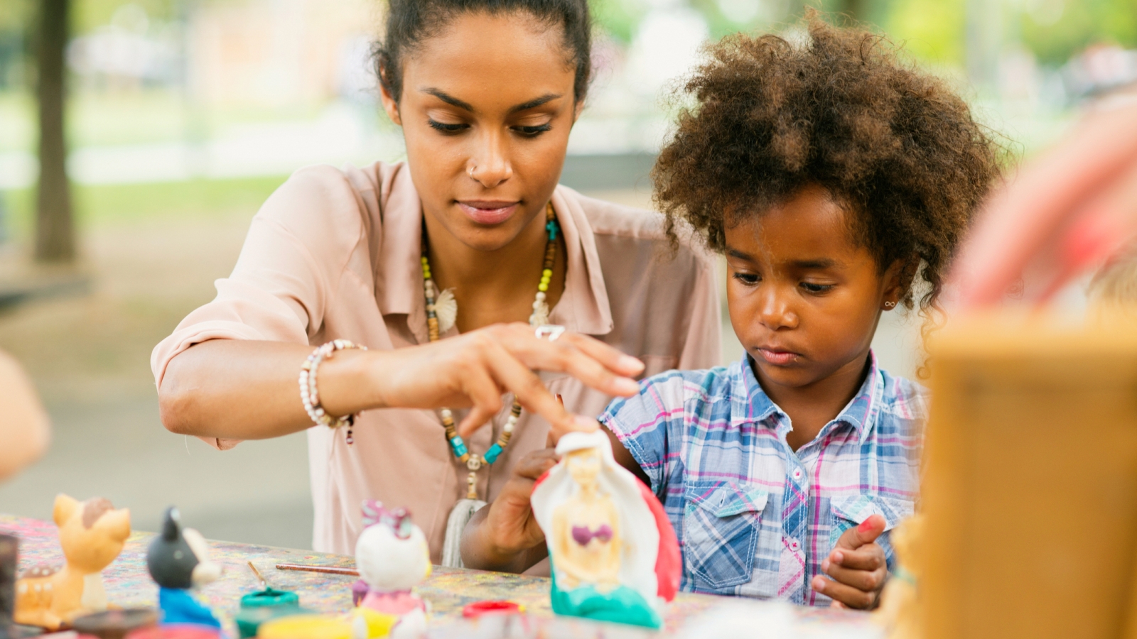 Adult and child doing arts and crafts